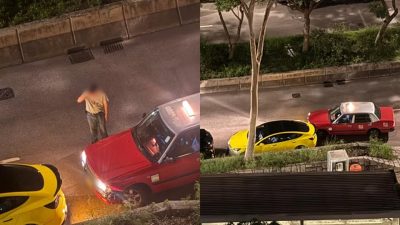 青衣的士撞及路邊私家車　司機落車查看後疑不顧而去
